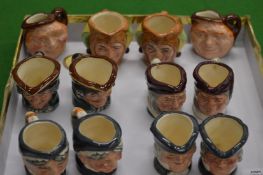 A collection of Royal Doulton miniature toby jugs.