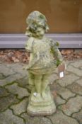 A small weathered garden ornament modelled as a young girl (faults).