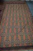 A Persian design machine embroidered bedspread 8ft 10