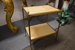 A brass two-tier etagere.