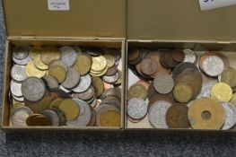 Two small tins of coins.