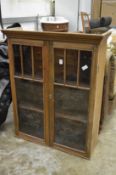 Pine two door display cabinet.