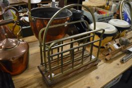 A brass and oak magazine rack.