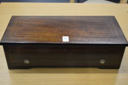 A good Victorian music box playing on 8 airs.