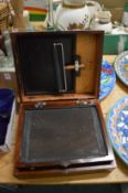 A mahogany portable screen printing box.