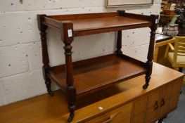 A mahogany two-tier buffet.
