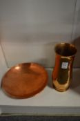 A Keswick hammered copper vase and similar dish.