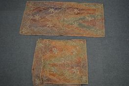 A gold thread embroidered table runner with six matching squares.