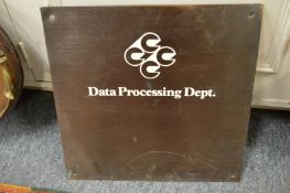 A bronze assurance sign.