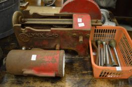 An old cast iron sausage making machine.