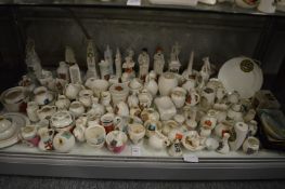 A collection of Goss and other crested china.