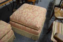 A pair of upholstered foot stools.