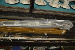 A pair of heavy duty galvanised garage door hinges, boxed, unused.