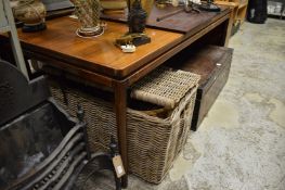 Modern rosewood extending dining table.