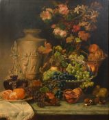 Circle of George Lance (1802-1864), an abundant still life of flowers grapes and other objects on