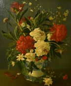 English School, Circa 1949, a still life of mixed flowers and foliage in a blue and white vase,