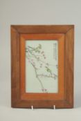 A CHINESE FAMILLE ROSE PORCELAIN PLAQUE, depicting birds on a prunus tree, inscribed and with red