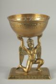 A FINE 19TH CENTURY INDIAN BRASS OFFERING BOWL WITH A GARUDA BASE, 17.5cm high.