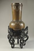 A FINE JAPANESE MEIJI SILVER INLAID BRONZE VASE, on a carved and pierced hardwood stand, with two