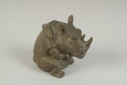 A JAPANESE BRONZE OKIMONO OF A RHINOCEROS, 6.5cm high.