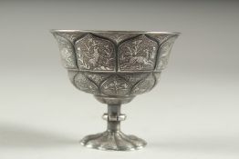 A VERY FINE CHINESE SILVER STEM CUP, embossed and chased with scenes of animals, 6cm high, 7.5cm
