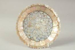 AN INDIAN GOA MOTHER OF PEARL PLATE, 19.5cm diameter.