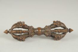 A TIBETAN BRONZE VAJRA, 14.5cm long.