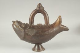 A RARE FINE INDIAN FISH SHAPED BRASS EWER, 29cm wide.