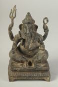 AN EARLY BRONZE GHANESH, 18cm high.