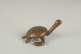 A JAPANESE BRONZE OKIMONO OF A TORTOISE, 8cm long.
