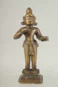 AN INDIAN BRONZE DEITY, 15cm high.