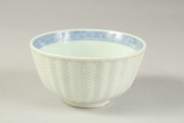 A CHINESE BLUE AND WHITE PORCELAIN BOWL, the interior painted with fish, six-character mark to base,