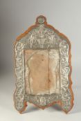 AN 18TH CENTURY OTTOMAN TURKISH EMBOSSED SILVER MOUNTED FRAME.