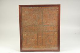 A FRAMED INDIAN EMBROIDERED TEXTILE, 47cm x 39cm.