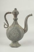 A FINE INDIAN BRONZE EWER, 32cm high.