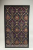 A FRAMED AND GLAZED ISLAMIC TEXTILE, 79cm x 44cm.