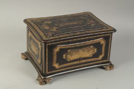 A FINE CHINOISERIE GILDED BLACK LACQUER SMOKER'S CABINET, with metal lined compartment and cigar