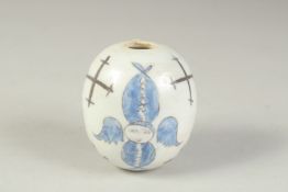 AN OTTOMAN TURKISH ARMENIAN KUTAHYA POTTERY HANGING BALL, 8cm high.