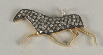 A DIAMOND SET HORSE CHARM.