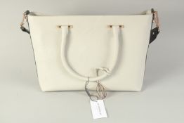 AN AMANDA WAKELEY HAND BAG.