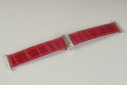 A NEW BOUCHERON STRAP in a white pouch.