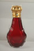 A SUPERB RUBY GLASS SCENT BOTTLE with gold top.