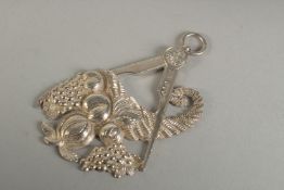 A VICTORIAN SILVER MASONIC PENDANT. London 1887, Maker: H. T. I.