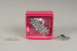 TWO BUTLER AND WILSON BROOCHES and A PAIR OF EARRINGS. (3).