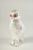 A SILVER PLATED OWL SUGAR CASTER. 6ins high.