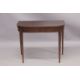 A GEORGIAN MAHOGANY CARD TABLE with folding flap, green baize cover, supported on tapering legs. 3ft - Image 1 of 4