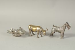 A CAST DOG, A BOWL AND A COW. (3).