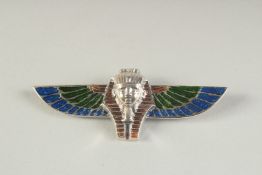 A SILVER AND ENAMEL EGYPTIAN REVIVAL BROOCH.