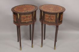 A GOOD PAIR OF LOUIS XVITH DESIGN OVAL BEDSIDE CABINETS fitted with three drawers with curving