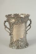A VICTORIAN REPOUSSE SILVER TWO HANDLED VASE. 6ins high, Sheffield 1900, weight:16ozs.